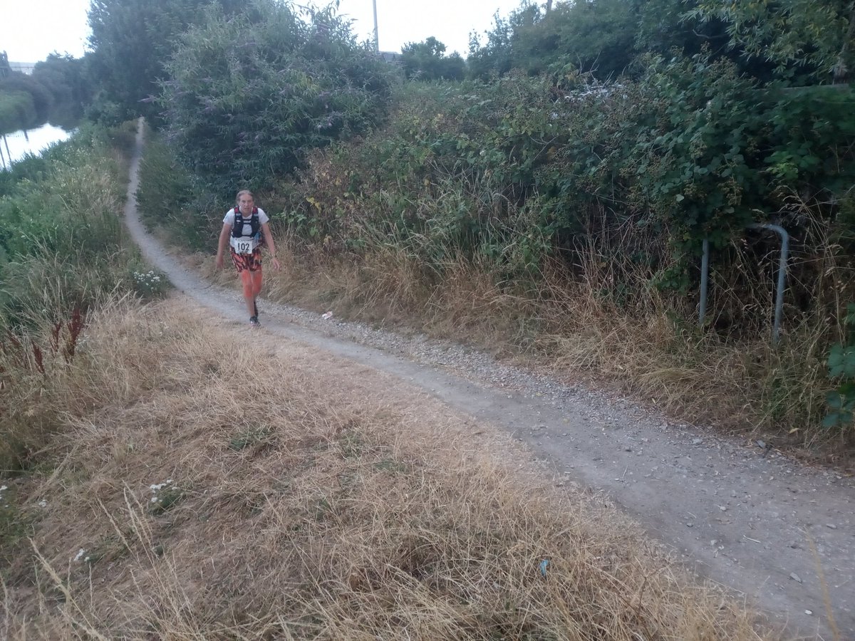 miles_together's tweet photo. Still running well as she passes through CP5, and we got to run together for a few miles as night fell 🔦 #KACR https://t.co/x2Ftrv440L