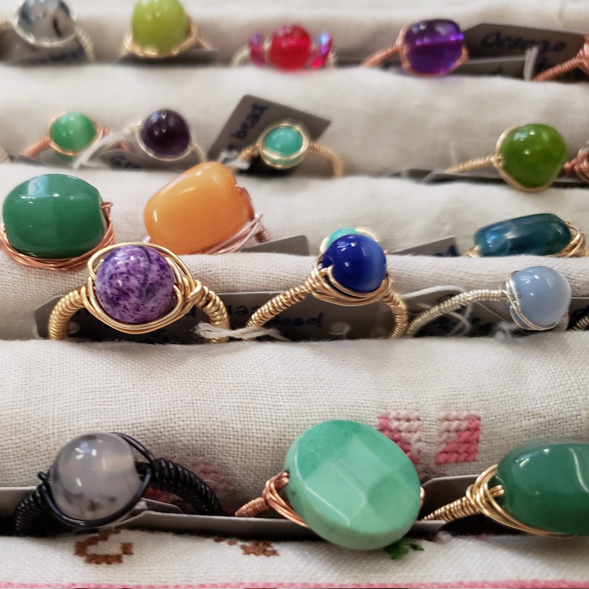 ShopAnalog's tweet photo. Brookland jewelry artist Dahbia makes these beautiful, stackable rings. Check them out this Saturday (along with the new display I made for them, thankyouverymuch)! 

#shoplocal #likesuperlocal #wirewrappedjewelry #jewelrymaker #brooklanddc https://t.co/BhurmcsLfx