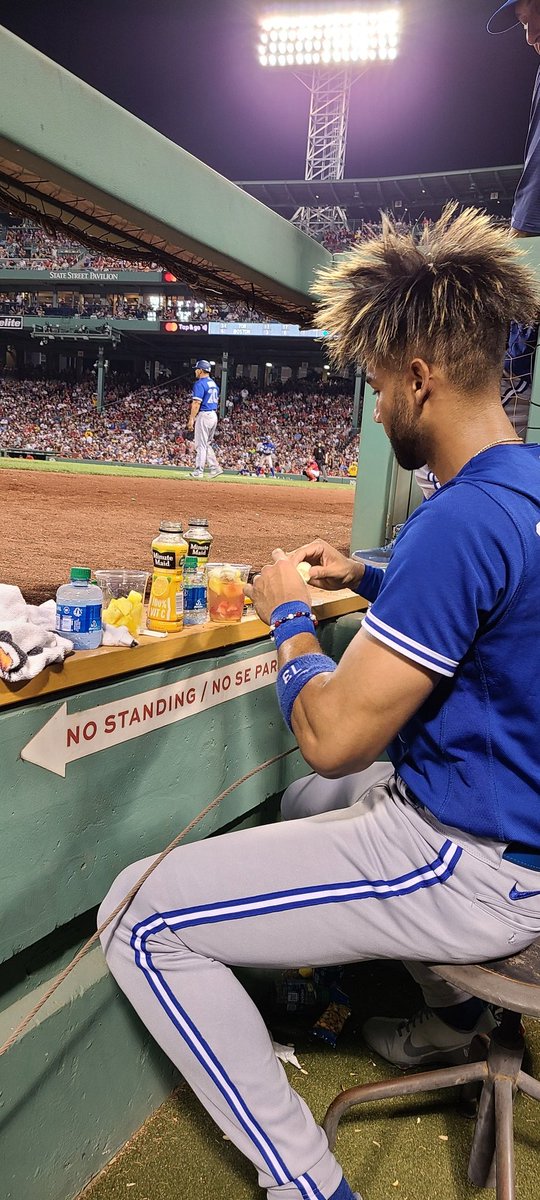 Lourdes Gurriel Jr. making himself a... fruit cocktail during the fifth inning of the ball game tonight.