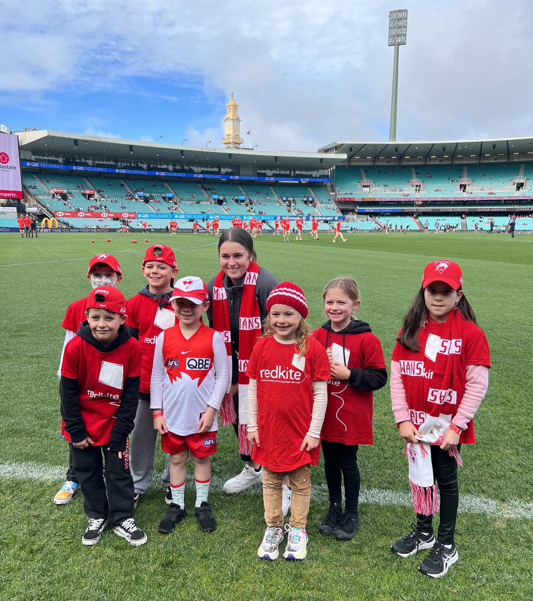 Some of our @Redkite families at Swans Red Day with @SydneySwansAFLW player Jaide Anthony❤️ Donate $20 or more for the chance to win return economy airfares to Europe thanks to @qatarairways : bit.ly/3yVLIXH
