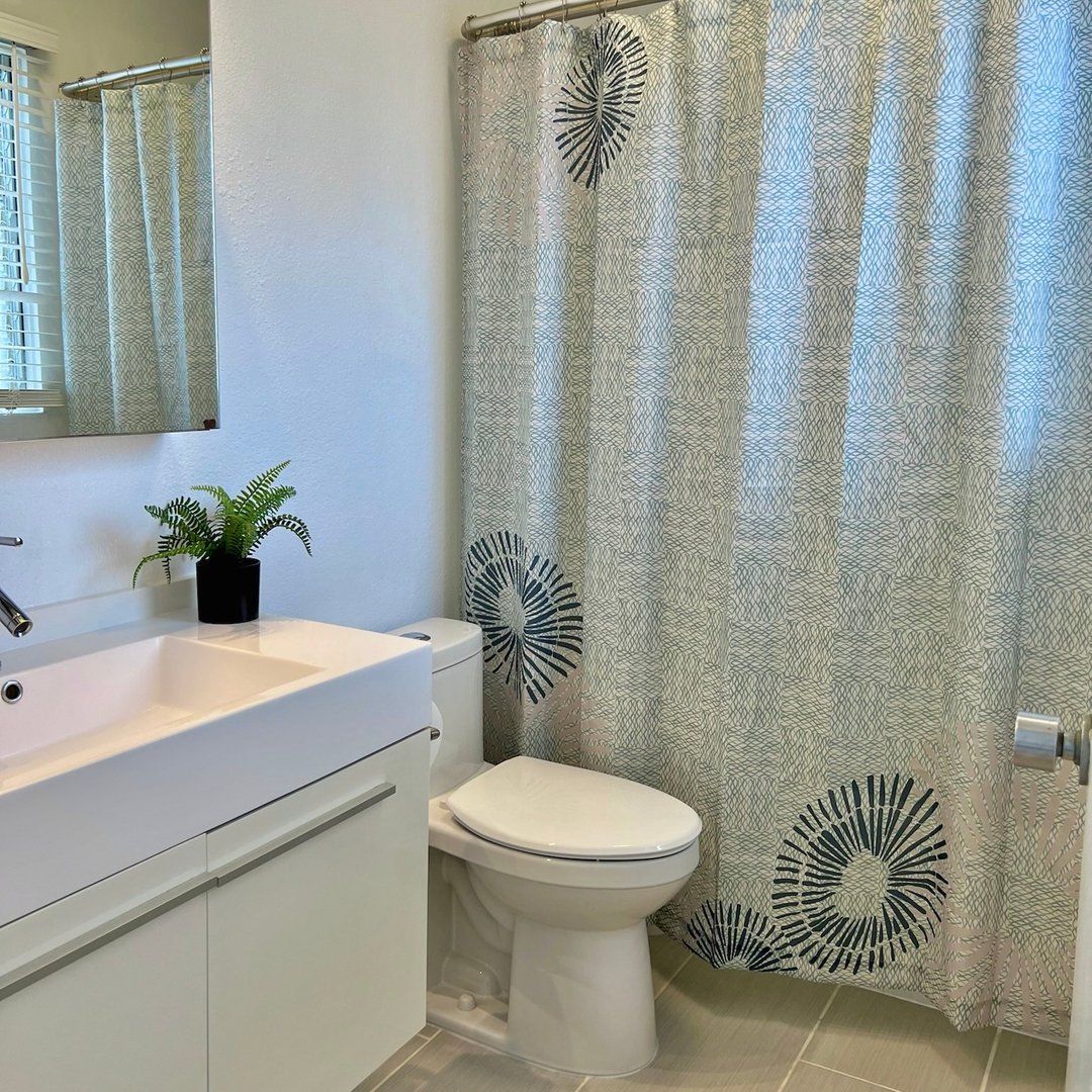 NohoHome's tweet photo. Continuing with our ‘Opihi theme, @redesignhi shows us how they like to infuse a little #StyleWithAloha into this serene bathroom space with our gorgeous ‘Opihi Shower Curtain! https://t.co/TtyNRK6c3k
