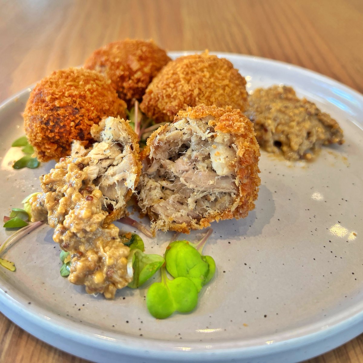 Ever wonder what's inside a Bitterballen?

A savoury and tender pulled pork meatball that pairs perfectly with our grainy beer mustard (a mustard with a kick!) 

A perfect snack to have with a glass our #FreshGLB beer!
