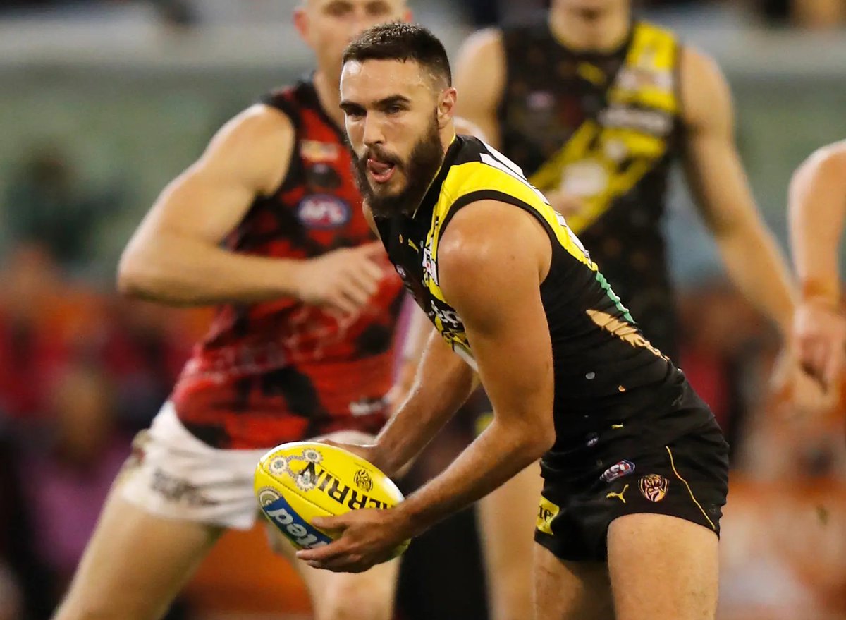 Tigers_of_Old's tweet photo. The Shedda tongue of concentration.😛🐯
A lightning fast footy mind that sees things others don't. 
As creative a play maker as any Tiger in our rich history.🏆🏆🏆
#Shedda300 #ShaneEdwards https://t.co/Nls5iBbUcT