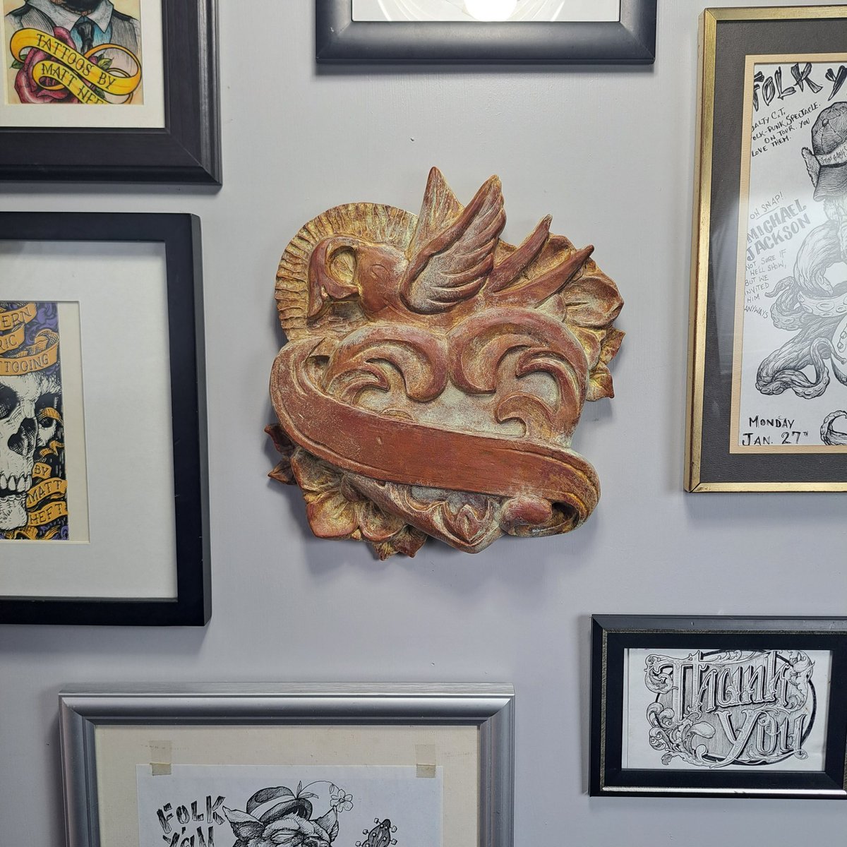 TinCupSigns's tweet photo. Got my wall set up! #tincupsigns #neotraditionaltattoo #neotrad #tattoosnob #neotraditional #traditionaltattoo #tattooflashart #tattooflash #tattooflashsheet #traditionalartist #goldenpaints #smoothon #reynoldsam #siliconemold #basrelief  #reliefcarving #plastermold #plasterart https://t.co/vXumCSHCG0