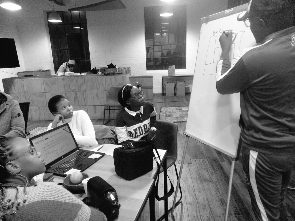 This kind of commitment... It's 03:00AM and <a href="/luckylitelu/">Lucky Litelu</a> is teaching a team about the Business Model Canvas. #ImvelisiJustHack