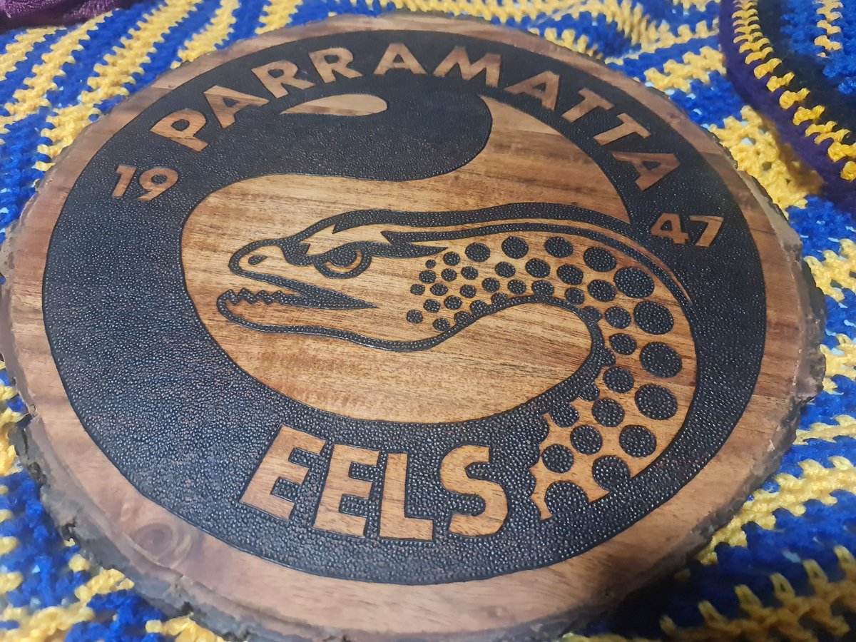 Jenkins93Chris's tweet photo. Friend of mine made me this custom burnt wood piece. I love it 😍 #parra #parradise #eels #parraeels #nrl @TheParraEels https://t.co/JqmkvSZb9q