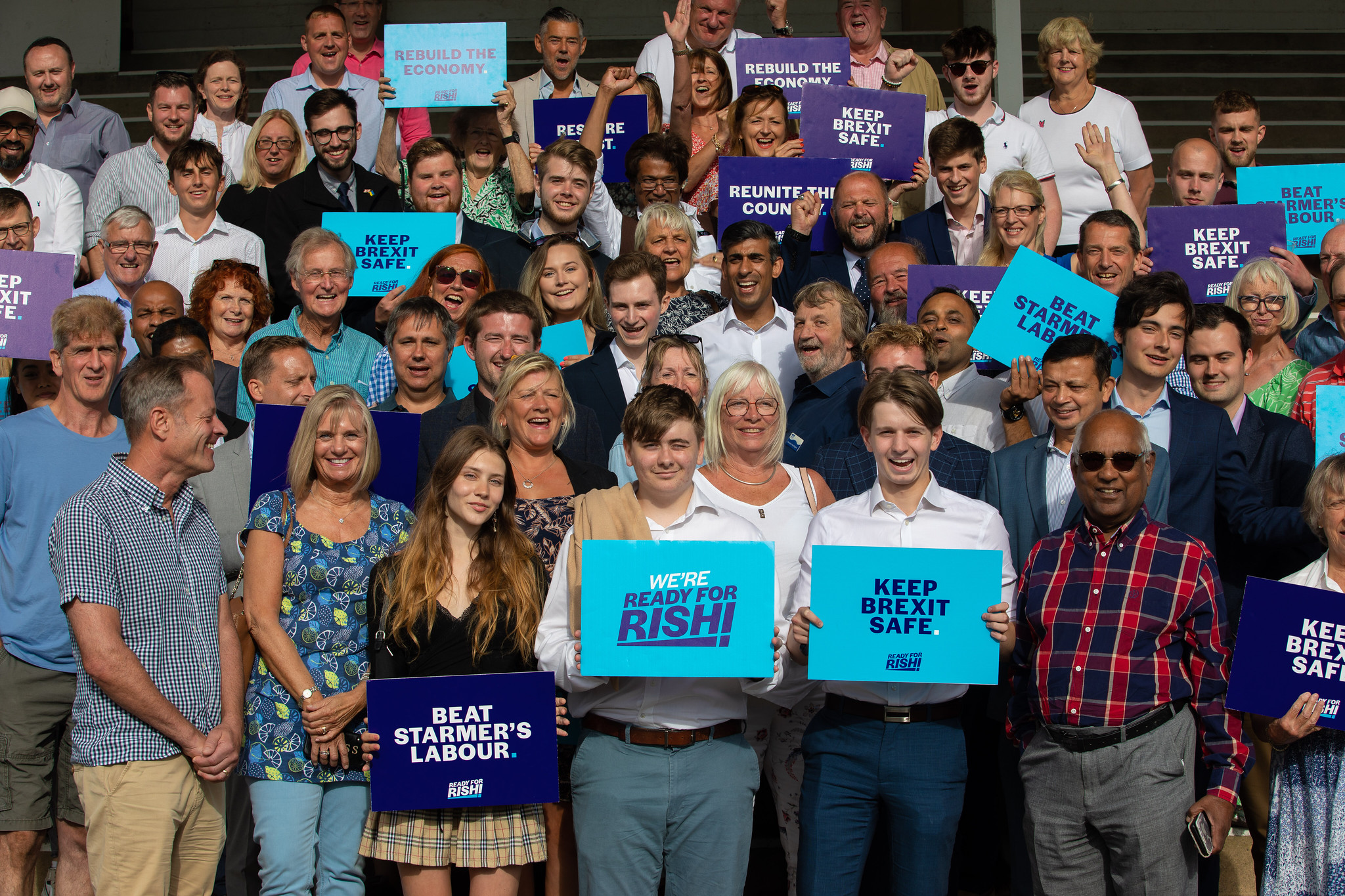 rishi with a group of supporters