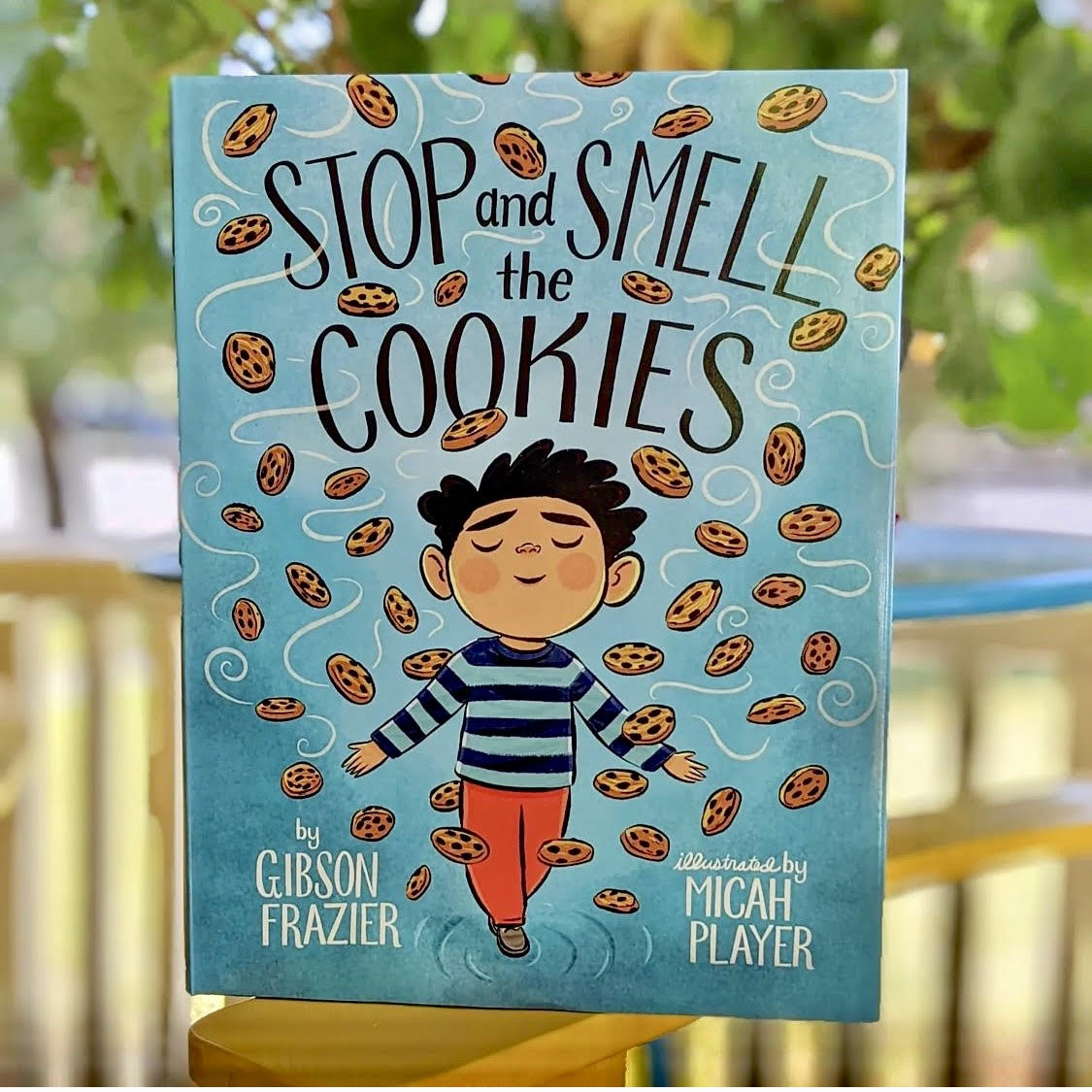 STOP AND SMELL THE COOKIES is a picture book written by <a href="/gibsonfrazier/">Gibson Frazier</a> and illustration by Micah Player about a rambunctious boy who learns to manage his big feelings.

Learn more: bit.ly/3oafOBZ