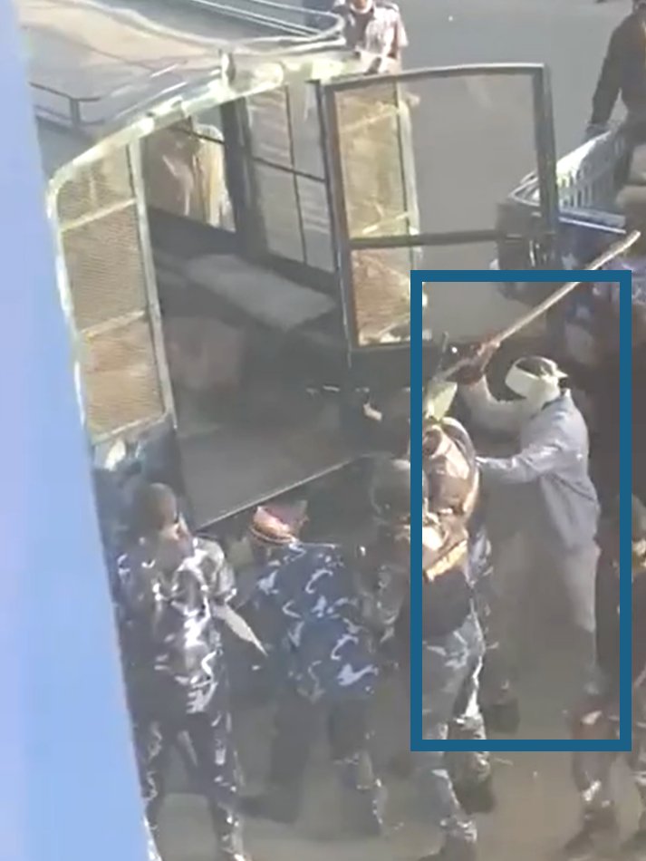 Sudan_Archive's tweet photo. One man is seen wearing civilian clothing and a scarf to cover his face. This man can be seen beating the detained man with what looks like a cane. We were unable to verify that this event took place on #Dec30thMarch although the owner of the video used hashtags of that day https://t.co/wcy2oUWnW5