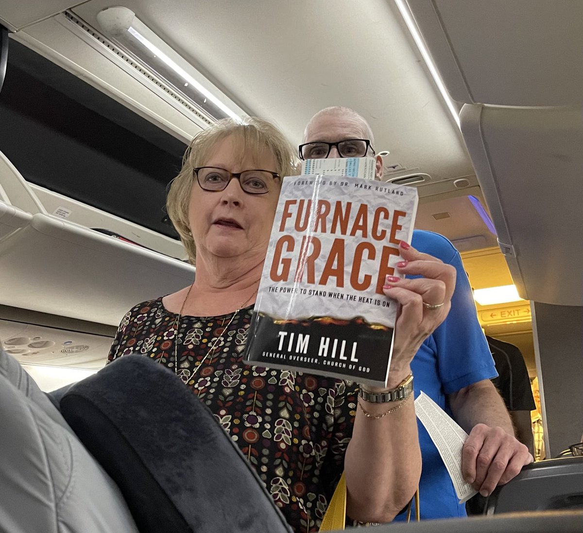 BishopTimHill's tweet photo. When folks get on the plane reading your book-That’s a good day. Of course half the plane was Church of God folks on their way to General Assembly. https://t.co/W2qB6XPKWK