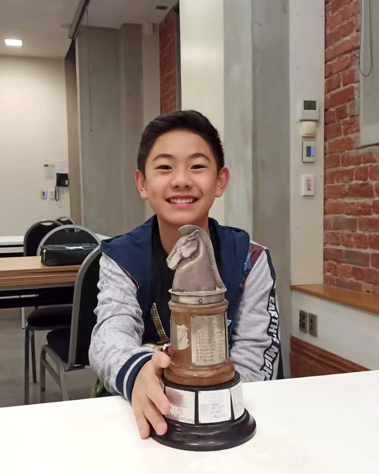 Felix Xie is a 13-year-old Candidate Master from Auckland, New Zealand.
His parents introduced him to chess and music at four and half years old. Chess helped him overcome the dread of losing games and taught him how to stay calm and composed after a loss.