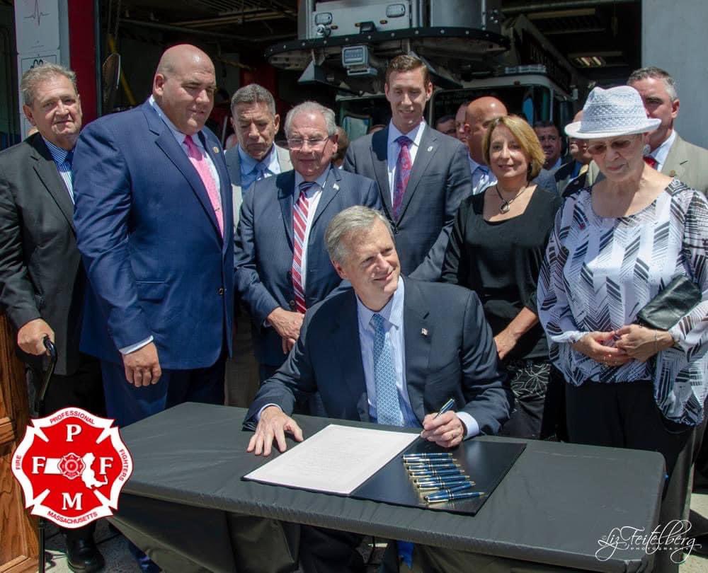 4 years ago today, in Lynn, <a href="/MassGovernor/">Governor Maura Healey</a> Charlie Baker signed the “Tony Colarusso” bill into law. Prior to this bill signing, firefighters diagnosed with an occupational cancer were forced to use their own sick time and could run out of time during their cancer fight. 1/2