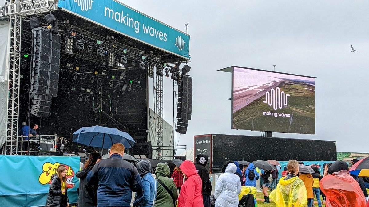 North_Ayrshire's tweet photo. It may have been a little bit of a damp start to the day but it's not stopping us having a great time at #MakingWaves22 Hopefully the weather will brighten up in the afternoon (but maybe bring a poncho anyway) 🌦️ https://t.co/AANR7kGYWq
