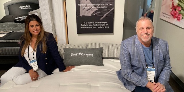 BedTimesMag's tweet photo. Las Vegas Market! Bedding Industries of America CEO Stuart Carlitz and his wife, Elis, showcase the new Artisan line of the Ernest Hemingway collection.

@LasVegasMarket @ISPAsleep #lasvegasmarket #beddingindustriesofamerica #sellingsleep https://t.co/P6ga1dDn1n