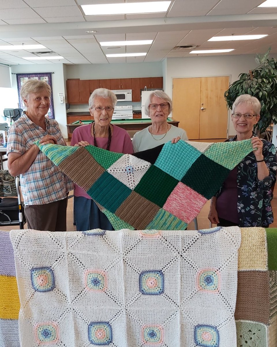 When the South Okanagan Women in Need Society donated these lovely knitted squares to The Hamlets at Penticton, these ladies took it upon themselves to create blankets and decided to give back to the community. They will be going to <a href="/Mymamasformamas/">Mamas for Mamas</a>. 👏