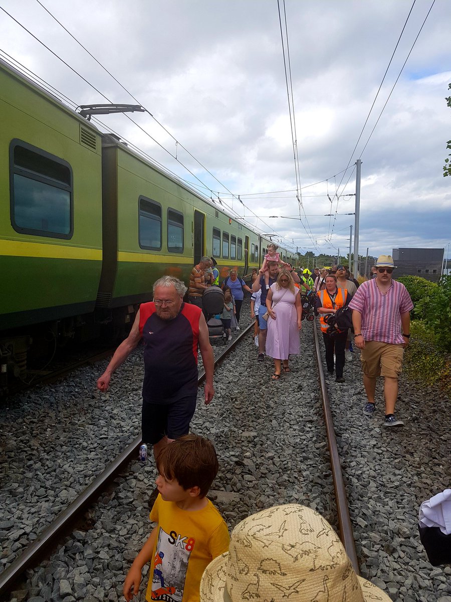 KeithMEWAS's tweet photo. DIsgraceful @IrishRail. Stuck on a sweltering packed DART service to Bray for well over an hour. People fainted. Adults &amp; kids had panic attacks and several of us tried to calm panicked passengers down. Some were so overwhelmed they prised the doors open and walked on the tracks. https://t.co/ysdGjZJJGY