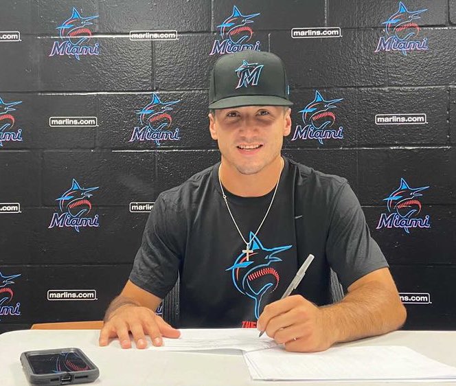 RutgersBaseball's tweet photo. ✍️ Pen to paper

Dale Stanavich is officially a Miami Marlin! 

#TCD https://t.co/Czbz2V1PAb
