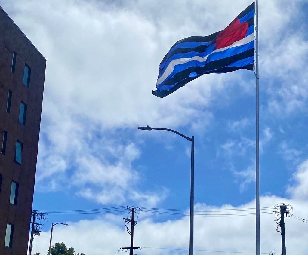Scott_Wiener's tweet photo. We celebrated the new farmers market at Eagle Plaza, in the Leather &amp; LGBTQ Cultural District in SOMA.

This new public space — which we helped fund in the state budget — has the largest leather flag in the world.

Whether farmers market or Eagle Beer bust, this plaza nails it. https://t.co/VUjG8SLbyb