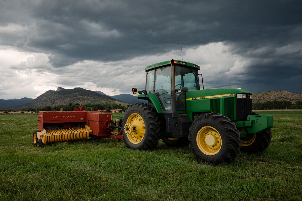 philmont's tweet photo. When Waite Phillips donated Philmont to the Boy Scouts of America in 1938 one of the conditions was to maintain the land as a working cattle ranch. The Farm and Roads department isn't often seen by participants, but works hard harvesting hay for the cattle herds across the ranch. https://t.co/7mj3rlWMk8