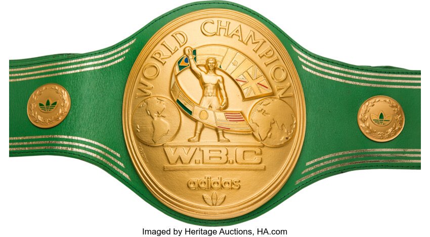 ringmagazine's tweet photo. Muhammad Ali's WBC heavyweight world title belt won in his 1974 'Rumble in the Jungle' victory over George Foreman has sold at auction today for $6.18 million. https://t.co/fz4ntrxFcV