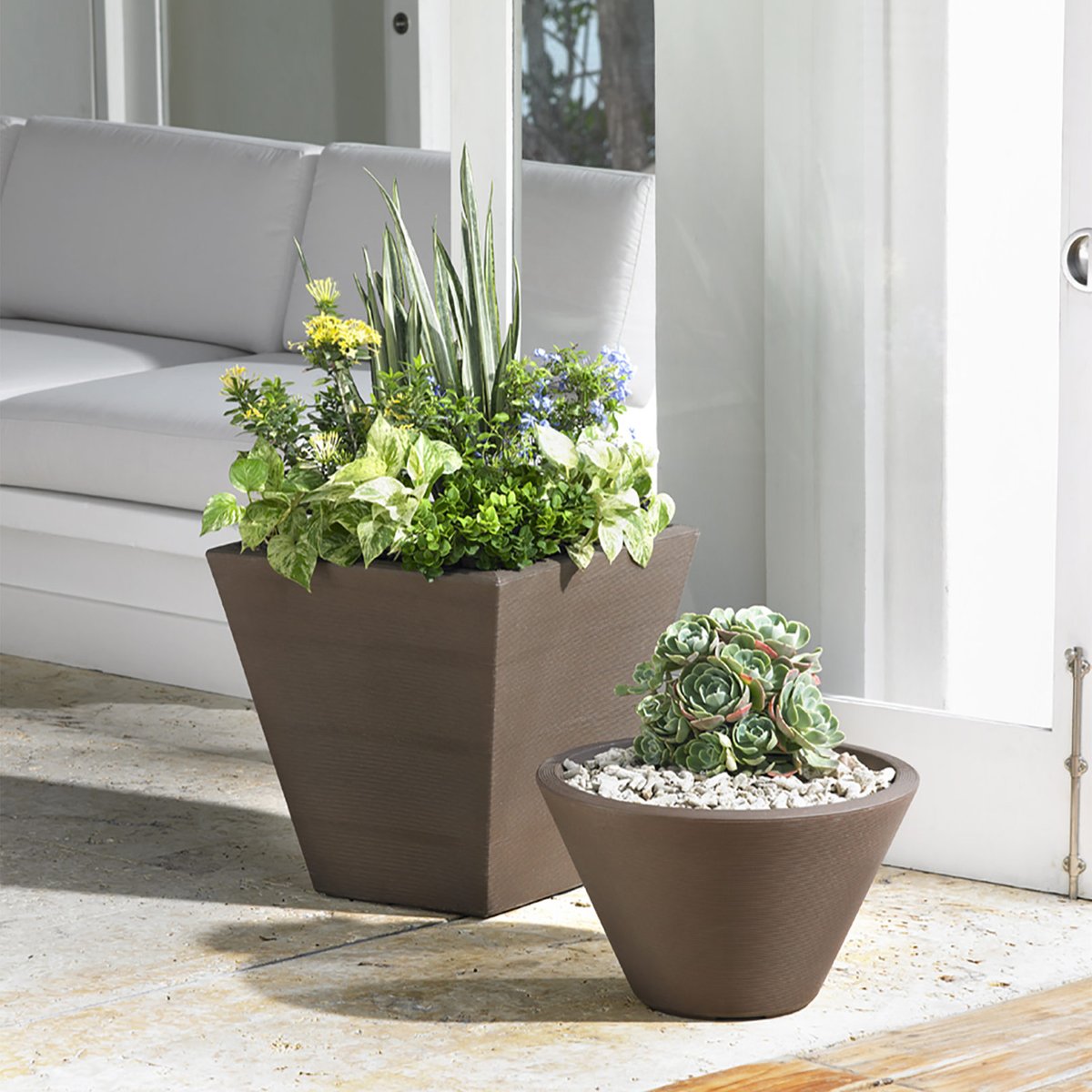 With their architectural interest, the Gramercy Round &amp; Square Planters are ideal for arrangements of low-profile succulents/rocks. Or they make for a more unique presentation for a traditional display of flowers and fillers.

◼️ bit.ly/32QokfT
⚫ bit.ly/3PUqBMr
