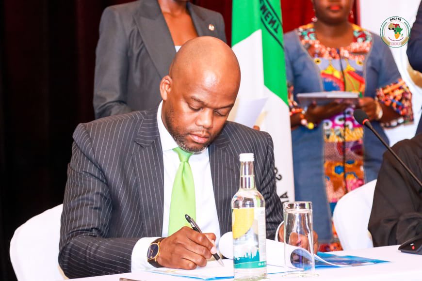 MeneWamkele's tweet photo. At the margins of the 9th Meeting of the Council of Ministers, Mrs @YacineFal @AfDB_Group Acting Vice President for Regional Development, Integration &amp; Business Delivery, joined me in signing 
the Protocol of Agreement for the grant of $11million for AfCFTA implementation https://t.co/KJ6uVATErm