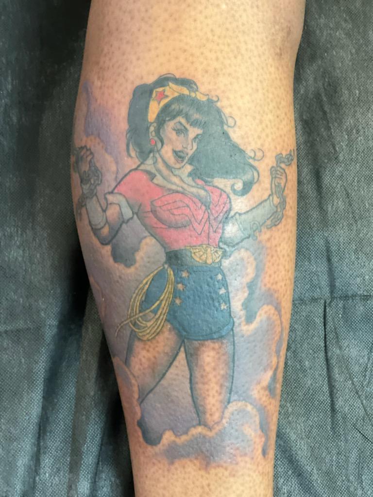 usmcsnoopy's tweet image. I'm loving my new tattoo every single day #WonderWoman #wwdc22 #dcbombshell #pinup #tattoo