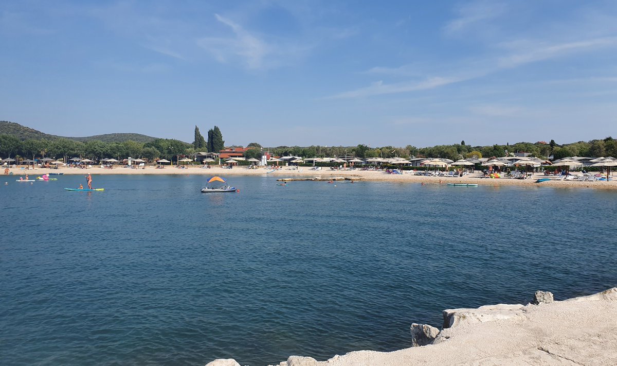 FreeMindCouple's tweet photo. Naturist village Valalta. Only 2.7km by the sea, but 33km by land from our spot at Koversada. We visited it for one day, and enjoyed every minute of it. Valalta has much more of everything - facilities, restaurants, people, attractions for children, music, parties. 1/2 https://t.co/bWdo7p6FWt