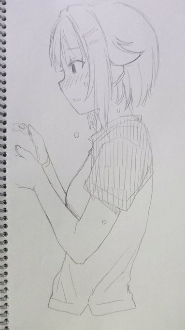 何かを拾う幸子 