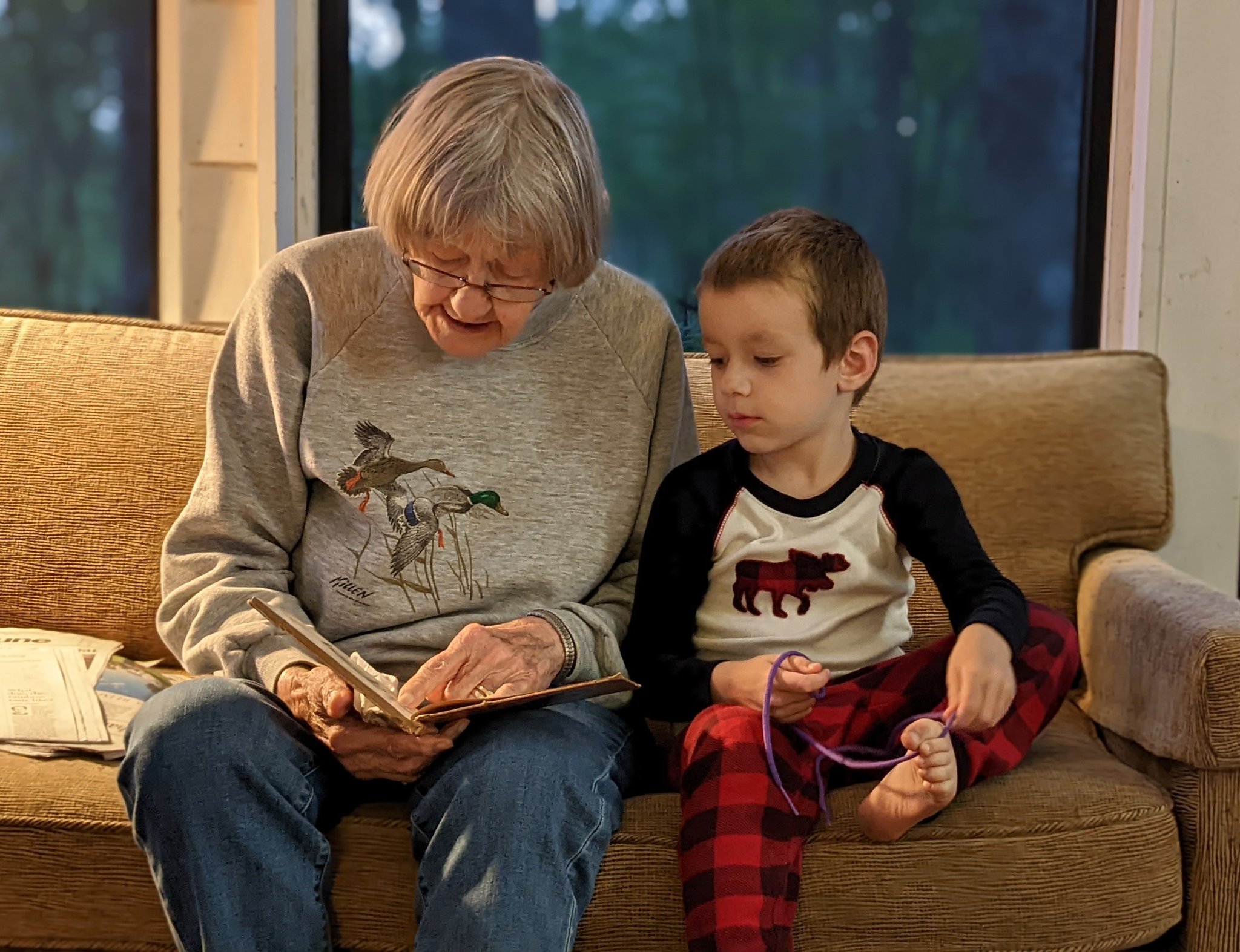 Sam Tobin-Hochstadt on X: “My grandmother, reading to my son from 
