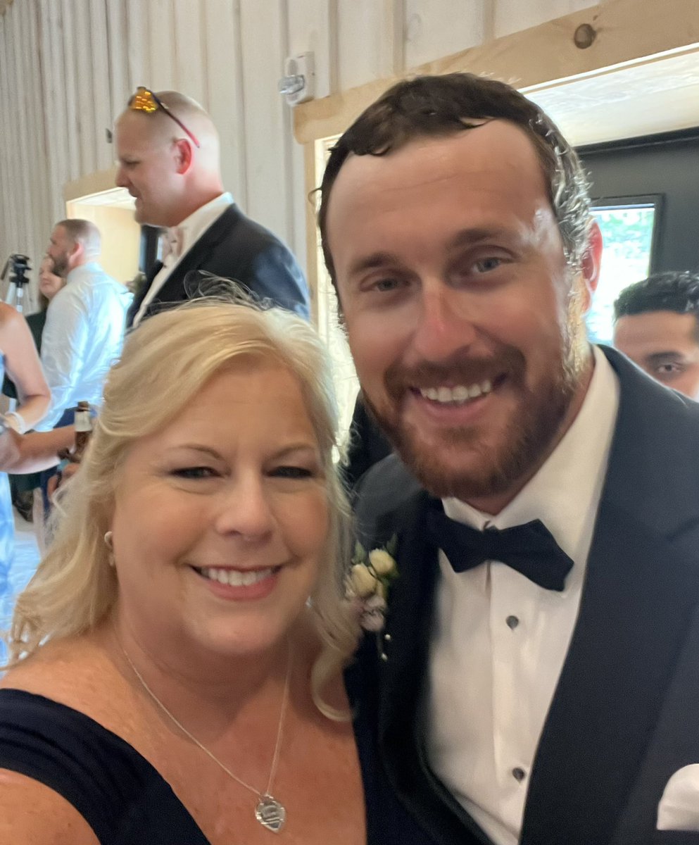 kimsr808's tweet photo. Me and my handsome baby boy on his wedding day. I’m so proud of the man he’s become! He and my new beautiful daughter-in-love and me with one of the best jobs all day. 🤎💍🍾 
#weddingday #momlife #motherofthegroom #daughterinlove #nanalife #son https://t.co/dNp2VQEaXI
