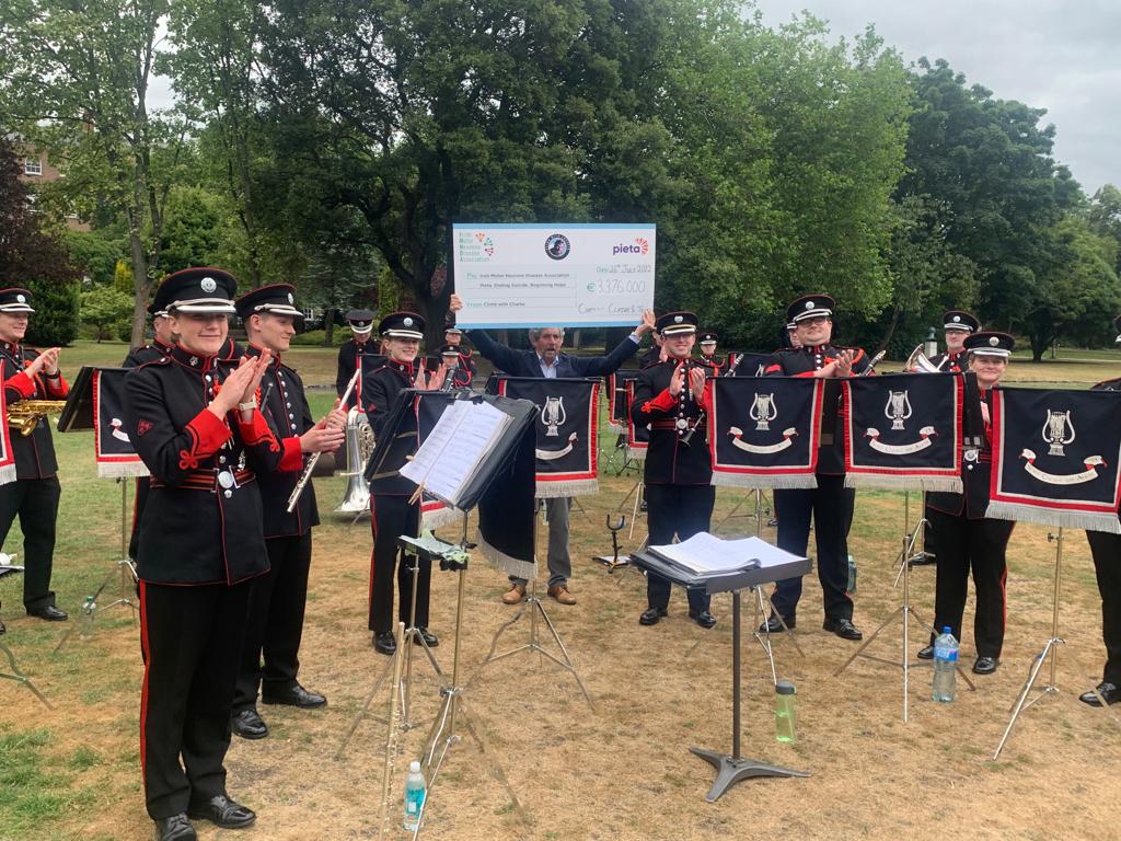 This morning in Merrion Square Park the amazing Charlie Bird presented his cheques to @PietaHouse & the Irish Motor Neuron Disease Association. He raised an unbelievable €3.4 million! Band 2 Brigade, Athlone, entertained the crowd with a little help from Charlie and Tiger!!