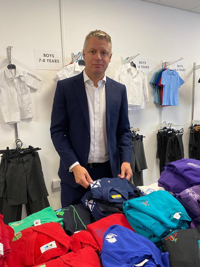 LukePollard's tweet photo. This morning I visited the Uniform Store on New George St in #Plymouth city centre. It’s their opening day and lots of people were donating old school uniform. The queue up the street shows the huge demand for this service - it also shows how many families are struggling. https://t.co/UJtqx7przg