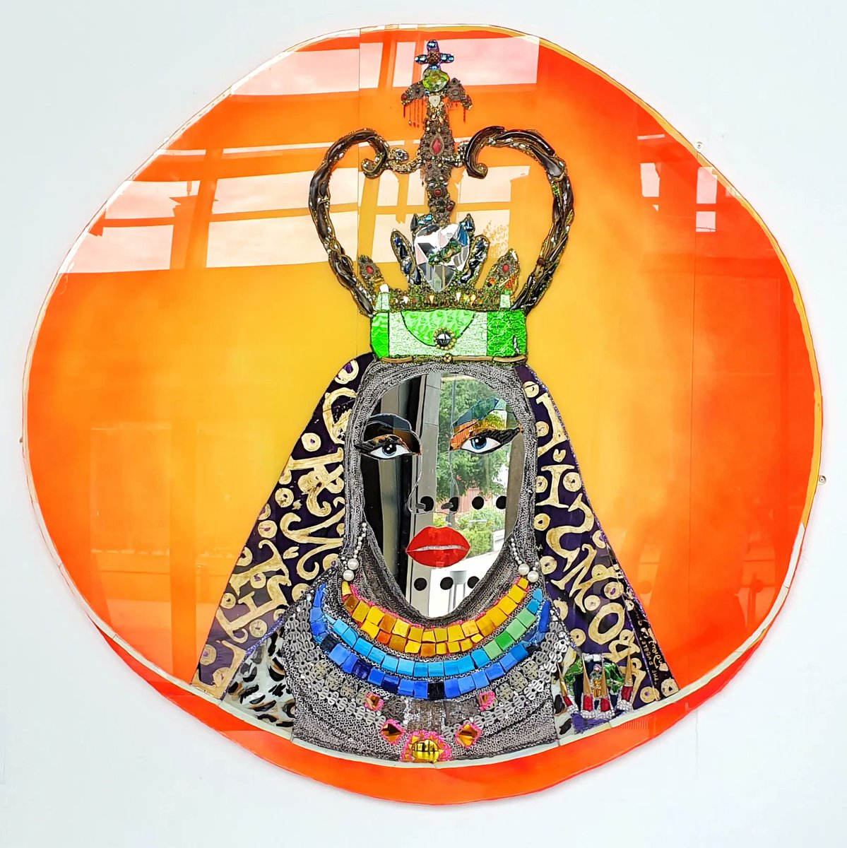 Daniel Lismore attended Alternative Miss World for the first time in 2018. He is an artist, fashion designer and club host.

Logan’s mirrored portraits are created by painting onto the back of the glass, a process which he describes as like painting in reverse.