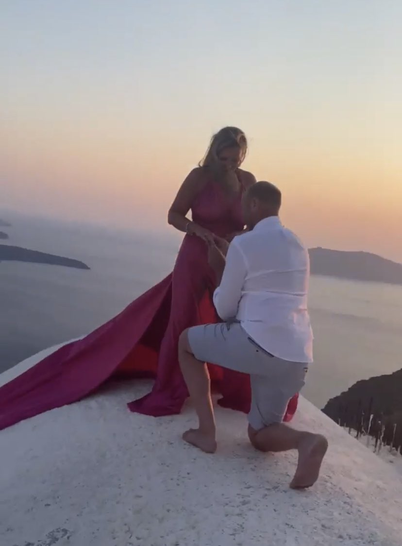 seghers_karen's tweet photo. And then this happened. Iโm the luckiest girl in the world. I said yes โค๏ธ #bestproposalever #Santorini ๐ฅฐ https://t.co/E3OjpzwoSU