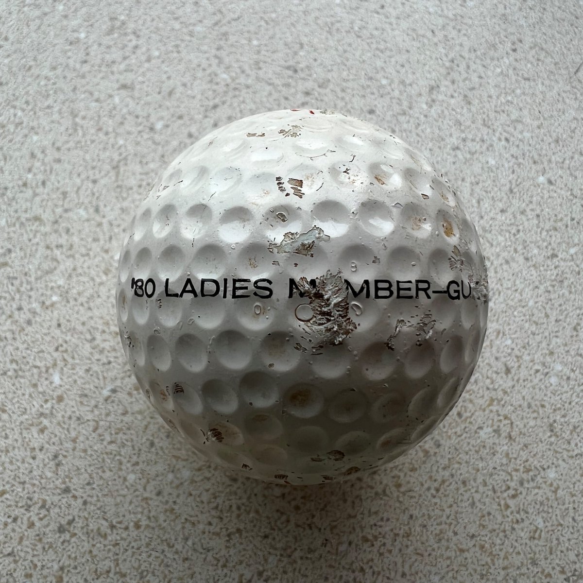 JoinMGCC's tweet photo. Would this be considered vintage? 🧐  We recently found a 42 year old golf ball on our course! {1980 Ladies Member-Guest}

#mgcc #marylandgolfandcountryclubs #marylandgolf #countryclublife #harfordcountymd #titleist https://t.co/iIU4mxI6eI