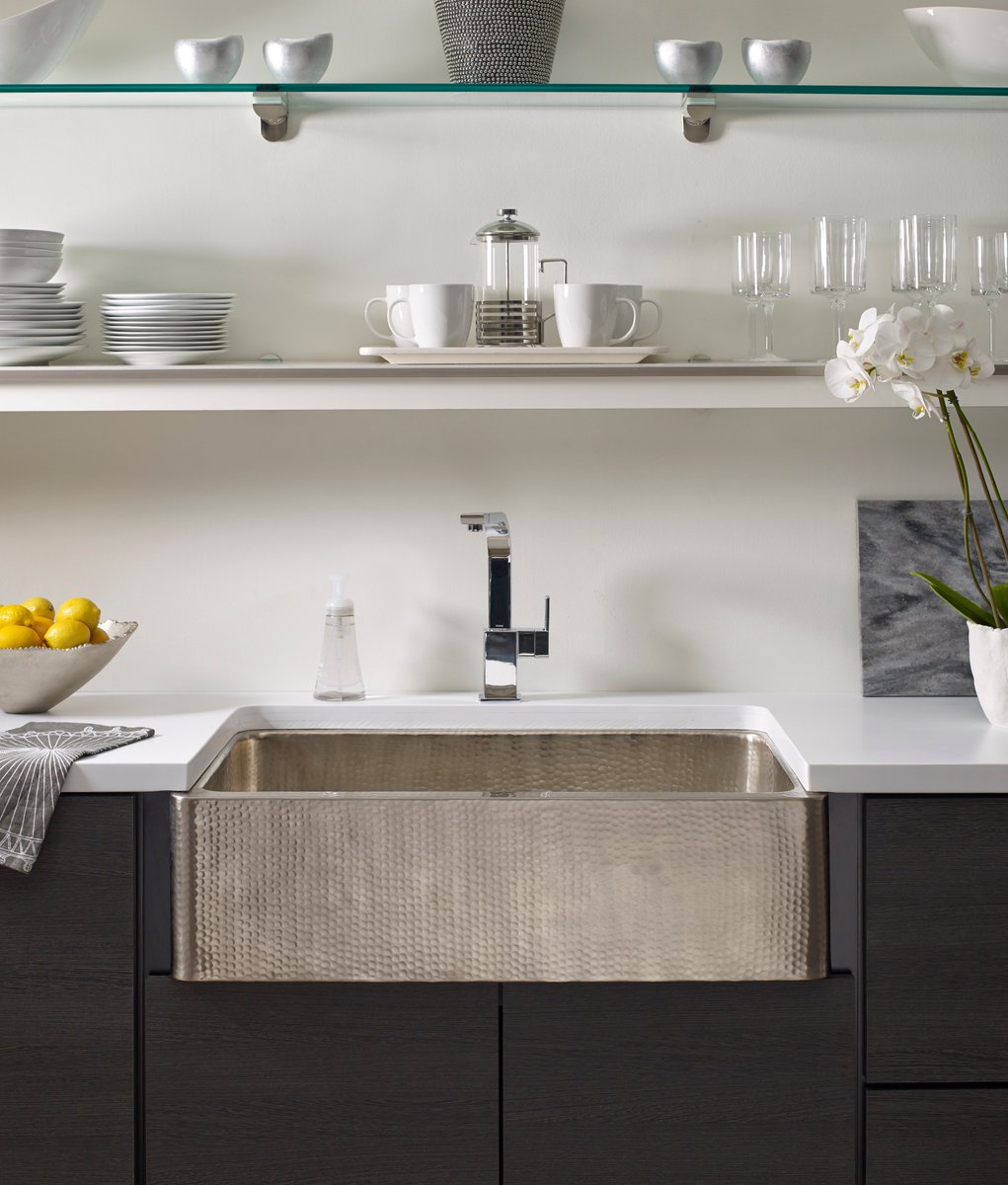 Whether you're in a downtown loft or stately country home, our Quiroga Hand-Hammered Stainless Steel sink is destined to become the focal point of your next project. Learn more at thompsontraders.com. #ThompsonTraders #InteriorDesign #KitchenDecor #KitchenDesign #sinkhole