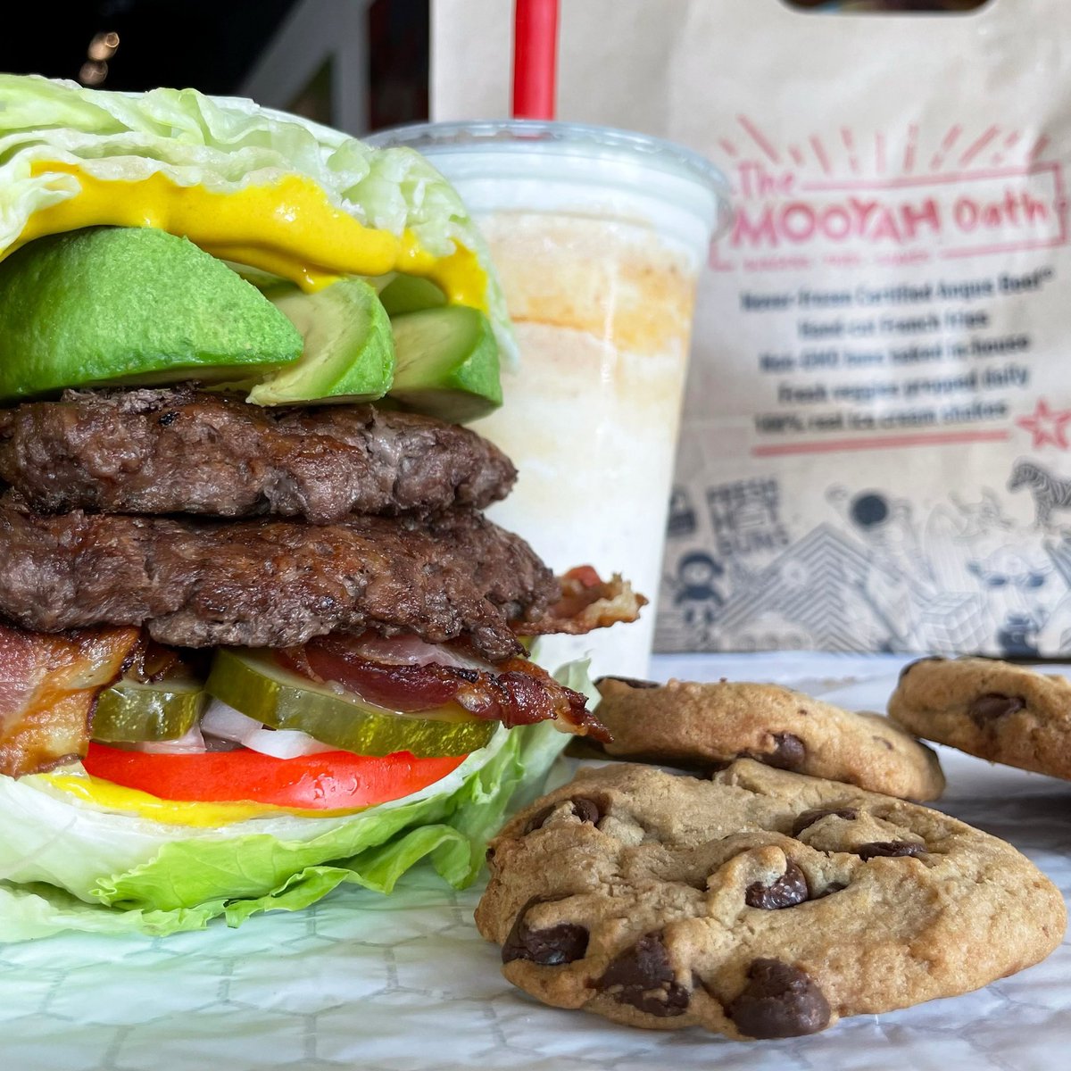 MooyahOC's tweet photo. It's the FINAL #TakeoutTuesday & your LAST CHANCE to grab 15% OFF any order TODAY ONLY at #MOOYAH Irvine. (Limit once per transaction, per account, per Tuesday each week in July.) 📲🍔🍪🥤😋 #paleoburger #peachshake #chocolatechipcookies #foodapp #irvine https://t.co/pYPnt5zUFc https://t.co/jiF7SUJ6cT