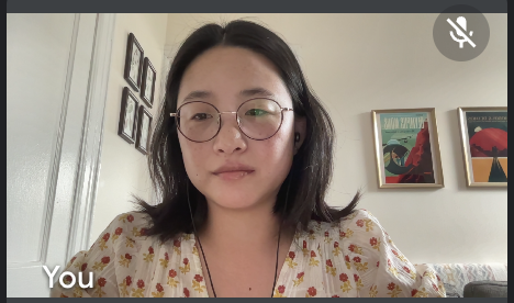 KayteZhang's tweet photo. Me giving a visual description on Zoom: I look like an unhappy teenager and I'm sitting in front of mass produced art https://t.co/aY7i6eo0N9