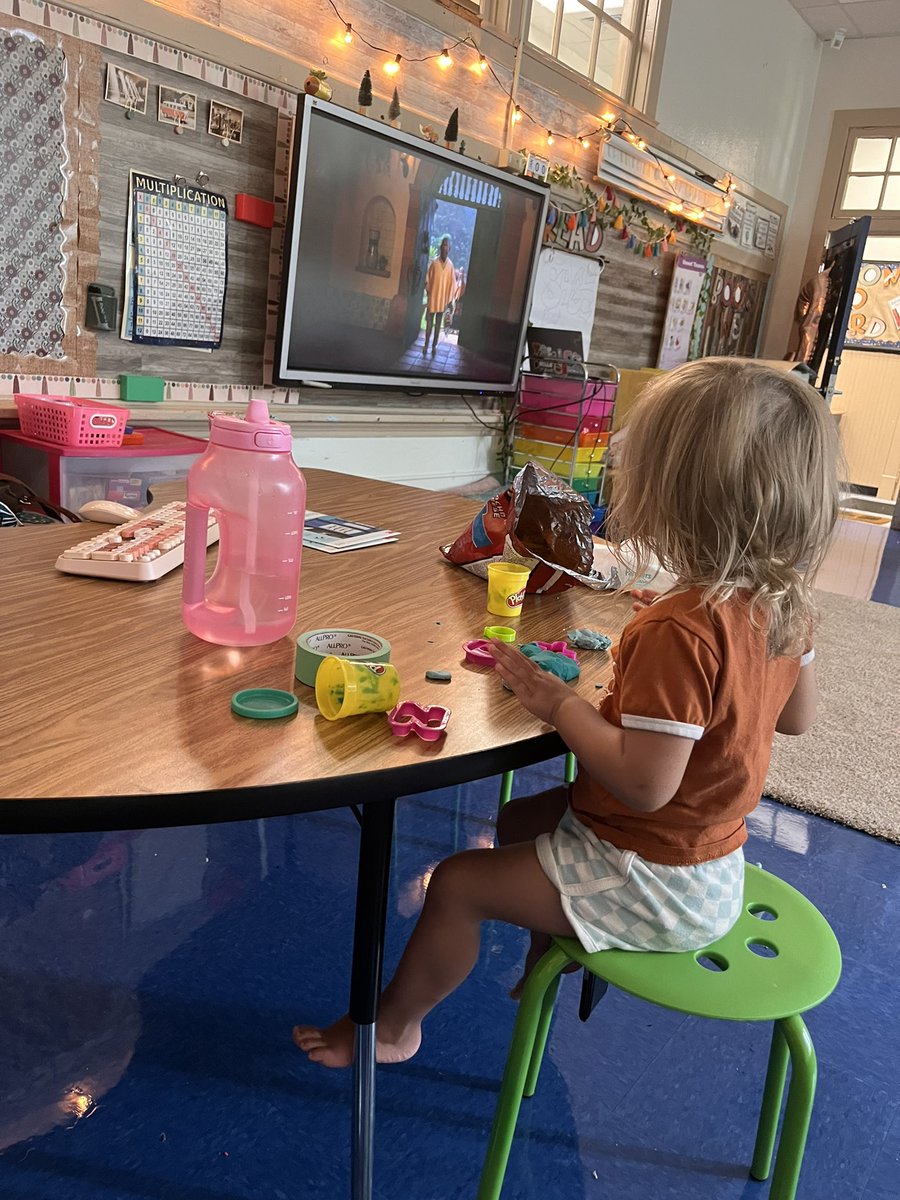 When mommy needs to get her class room ready.. you watch Encanto, play with play dough, and eat Doritos! 
#teacherlife #thirdgrade #setup