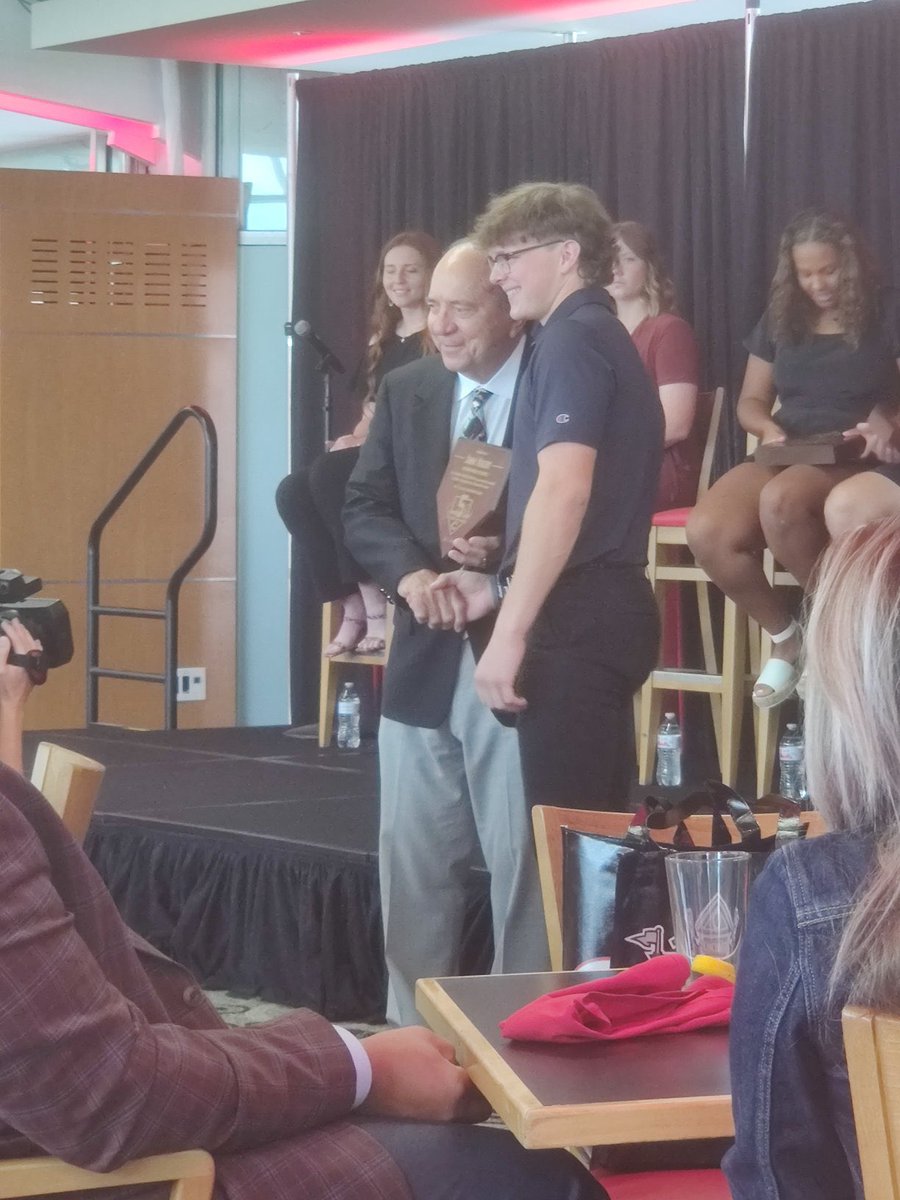 BadinBaseball's tweet photo. Congratulations to Jimmy Nugent!  2022 Johnny Bench Award for catcher of the year for Ohio. Tremendous ceremony today before the Reds game!  Our catching coach Matt Marcum and pitching coach Chuck McKinney were there to celebrate this incredible honor! https://t.co/t3Za0cx9ZL