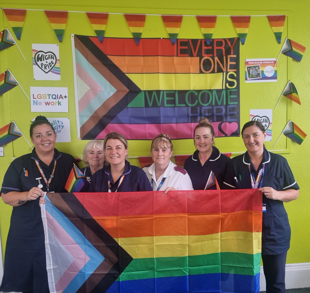emzy1980's tweet photo. Hindley District Nurses showing their support at Hindley Town Hall for Wigan Pride #wiganpride22 #WWLNHS #Districtnurses #everyoneiswelcomehere https://t.co/ytqTbkn44u
