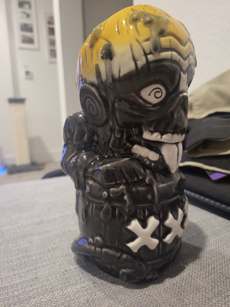 Showing off my Tar Man from Return of the Living Dead tiki swag