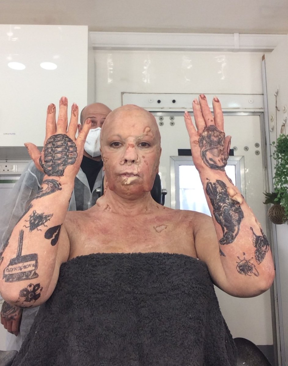 10. Becoming #MotherZero. Tattoo time. Many of the tats reference the games. There's a mansion on one arm, a Welcome to Racoon City sign, a crow, a gas mask. I'm a walking Easter Egg. #ResidentEvil #ResidentEvilNetflix #tattoos