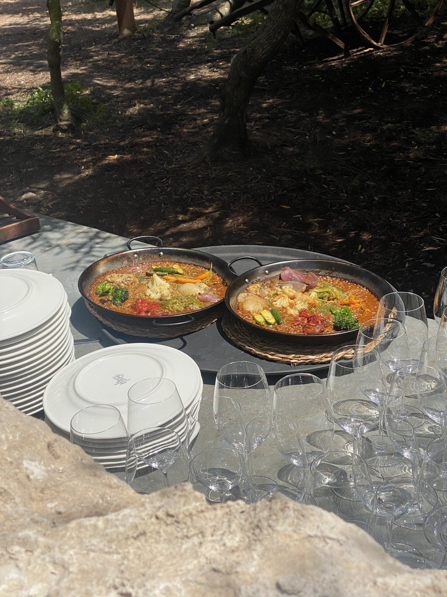 Anyone recognize this dish? I’d love to try and cook it. It appears to be rice cooked in tomato topped with grilled veg. I followed my nose and spotted it over a wall in Menorca.