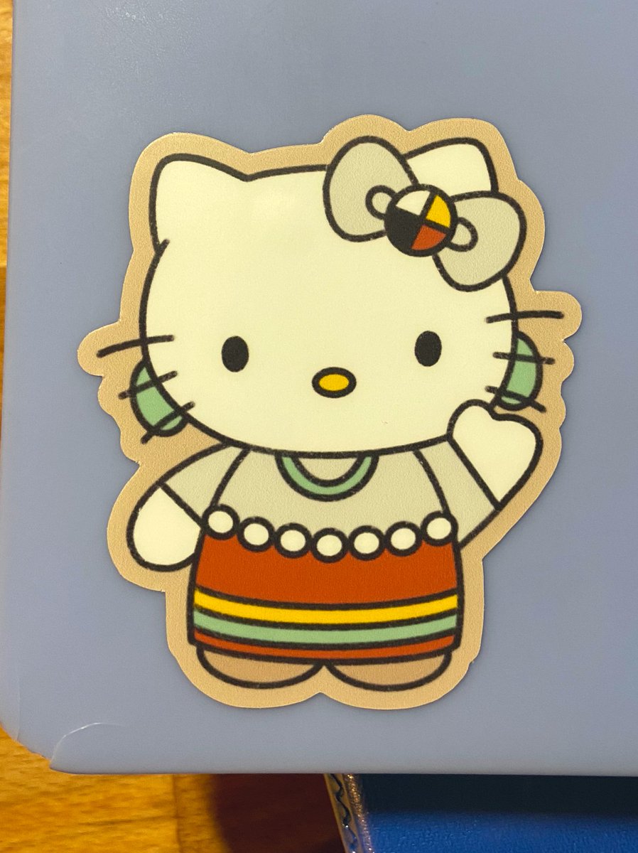 CayceOTR's tweet photo. Btw, my college kiddo has a new sticker! Powwow kitty #supportindigenousartists @DesignsKalmia https://t.co/r2WAXPA1PU