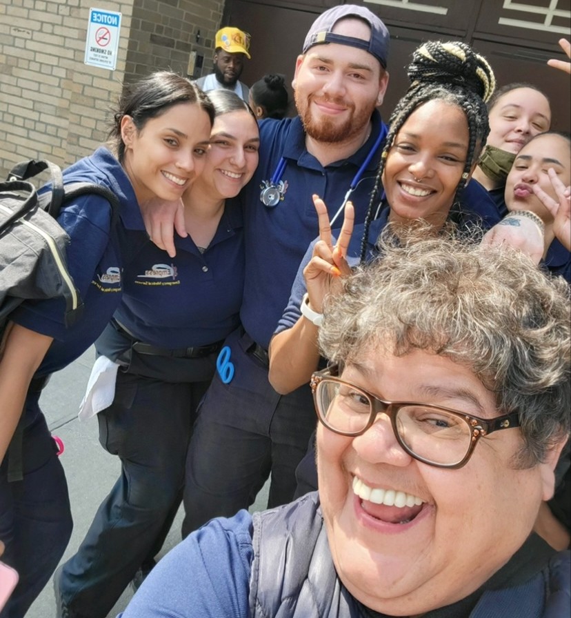 EmpressEMS's tweet photo. Warren Parker and Maria Figueroa with our Code One employees. They are teaching the students all the essentials that are necessary for good patient care and to successfully pass the NYS EMT exam. #FutureEMT #EMT #CodeOne https://t.co/Il1kFvm5o8