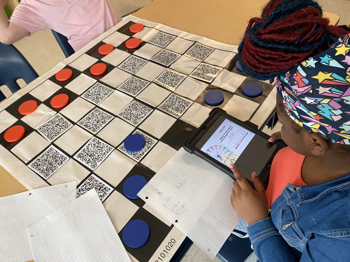 Today 4th grade used checkers to review all the skills they learned during summer school. The students task was to choose a QR code and answer the question correctly to move their piece. The students had a great time playing this game!