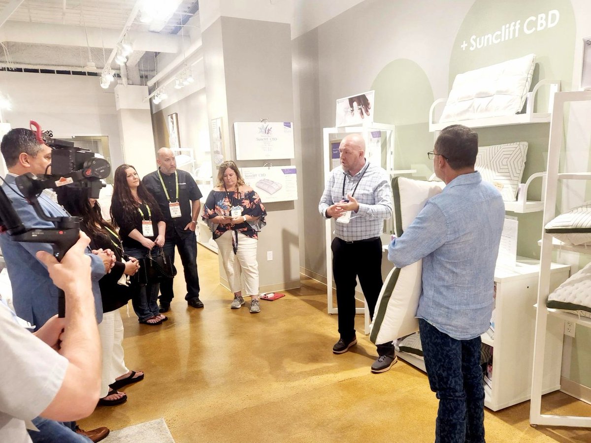 SuncliffInc's tweet photo. Our Suncliff CBD pillow was a big hit at the Las Vegas Market. You can see Mattress Firm Texas CEO James Perez holding it through our entire presentation, not to worry though he eventually gave it back 😀 #suncliff #buildyourbrand #sleepbetter https://t.co/vqdIympnCX