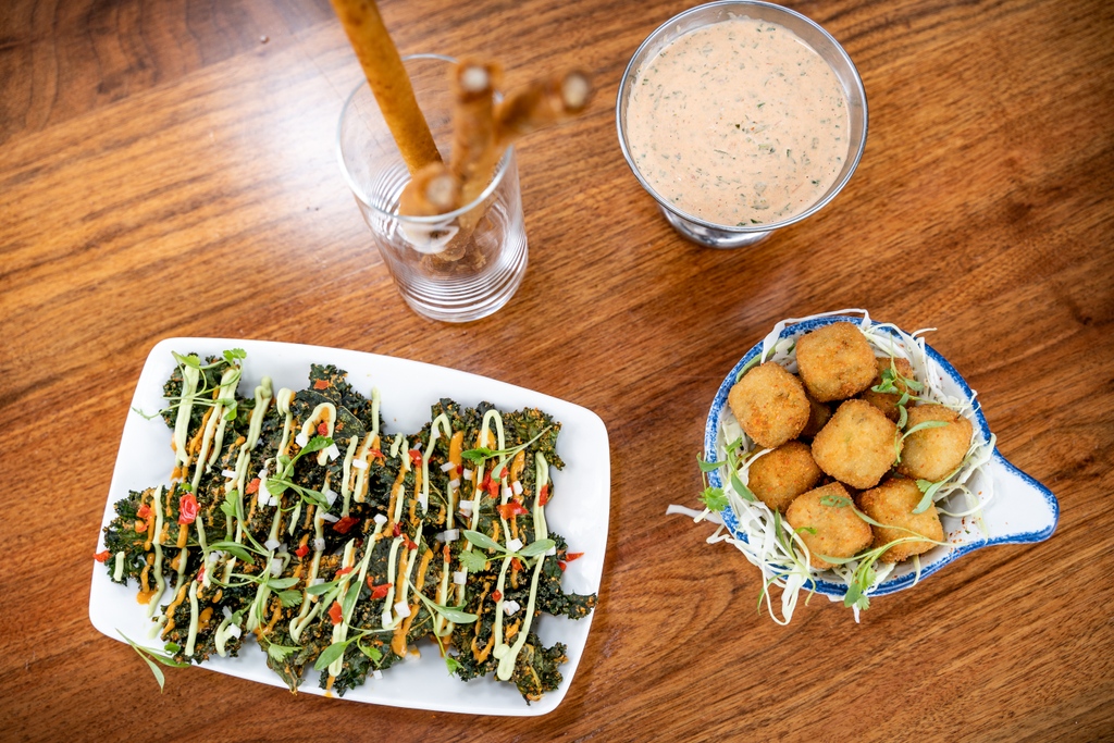 Our vegan kale nachos, Moroccan chicken taquitos and pot-pie poppers are among the discounted happy hour snacks offered at the bar weekdays from 3:30-6:30 p.m. See you soon!!